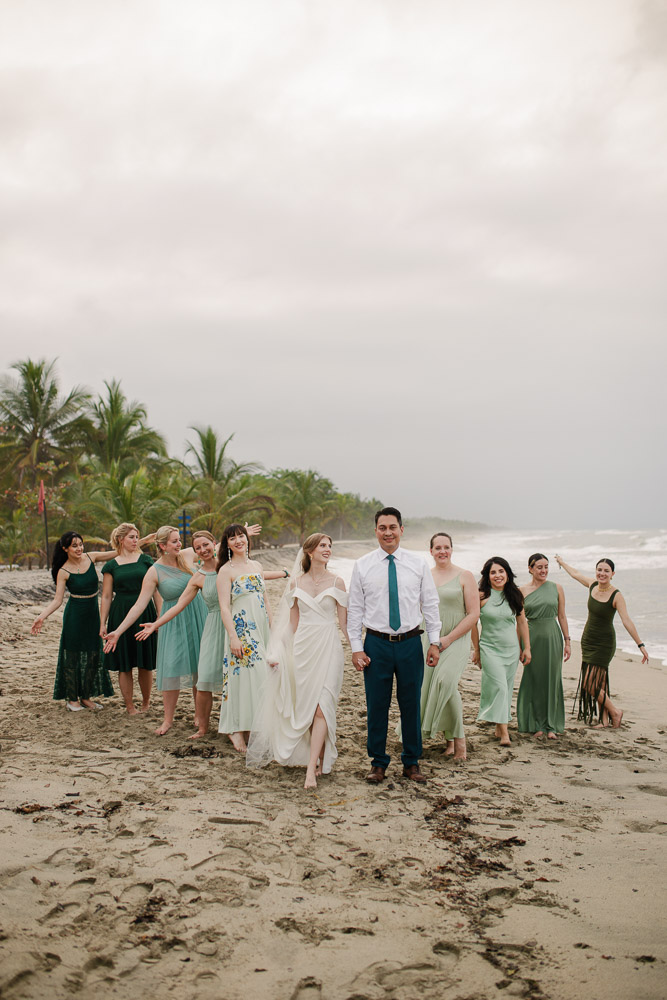 A wedding party during the photoshoot on the beach in Santa Marta, Colombia