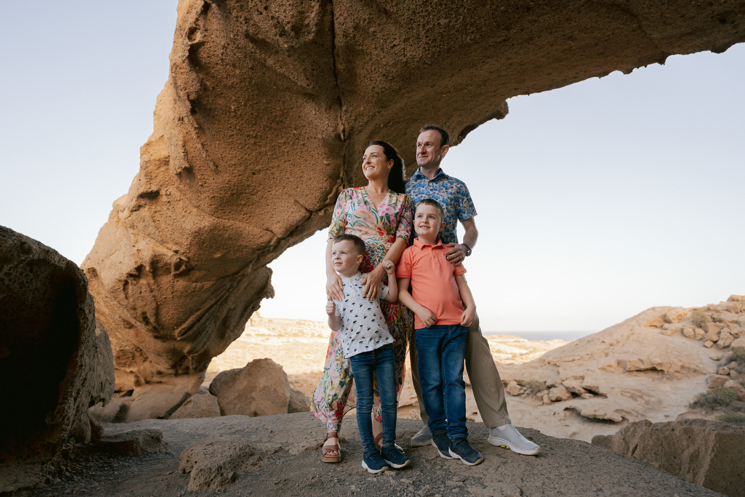 Family with kids having a photoshoot in Arco de Tajao, Tenerife
