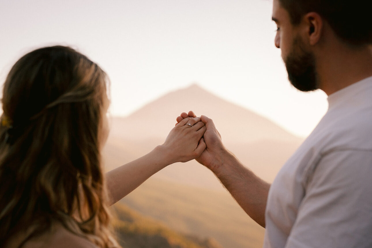 Engagement at Mount Teide with the volcano in the background of the couple