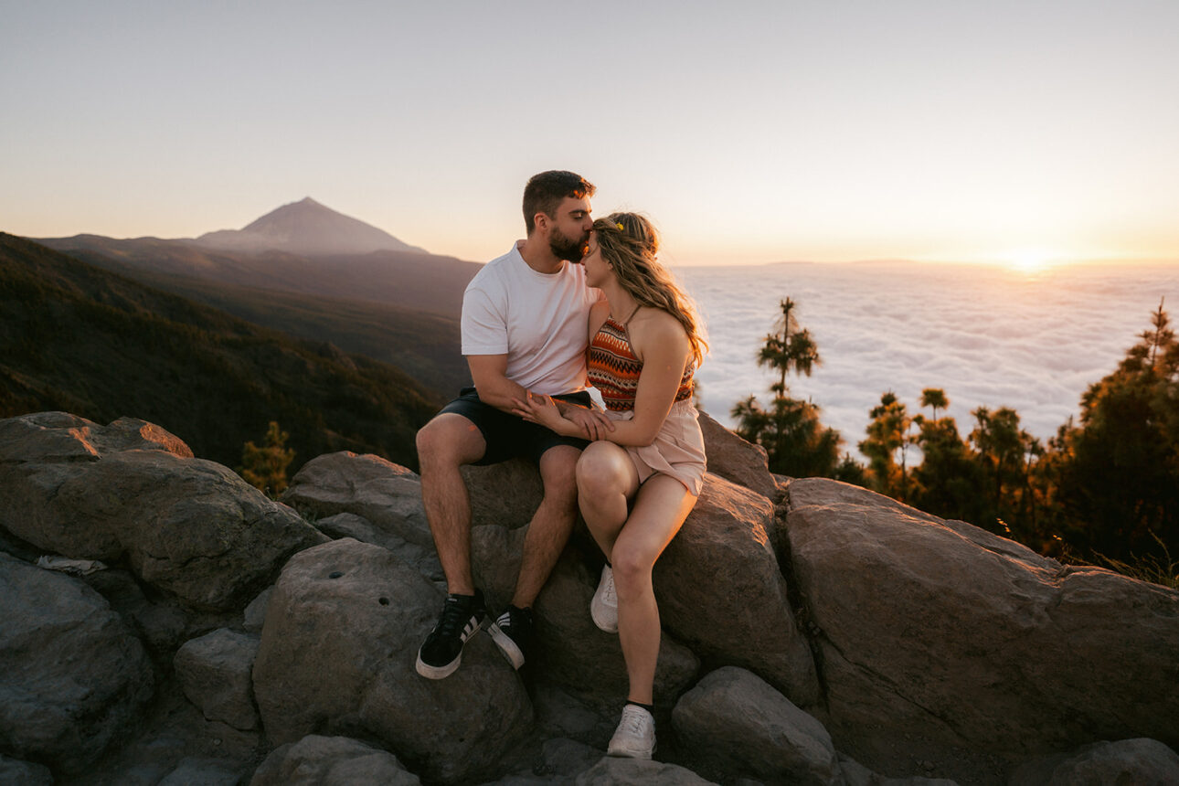 Mount Teide proposal above the clouds with a newly engaged couple looking at the ring at sunset